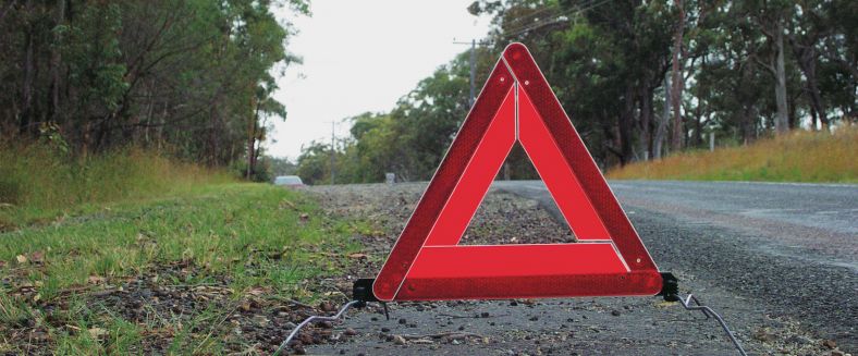 Warning Triangle on the Road