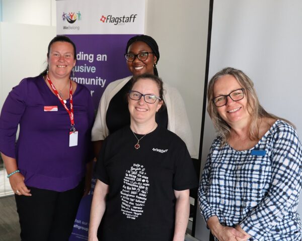 Emily as ambassador at Vincentia Inclusion Awareness Event. Group photo.